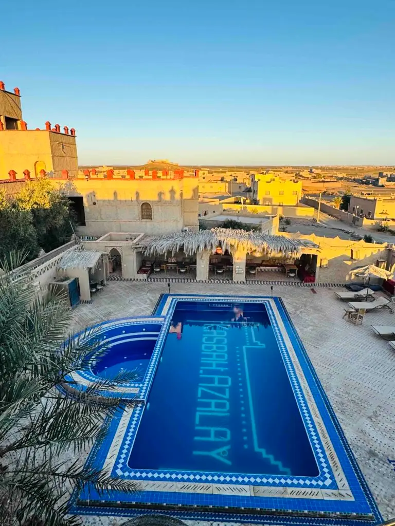 View of the pool and courtyard in Kasbah Azalay Merzouga on Morocco 10 day itinerary